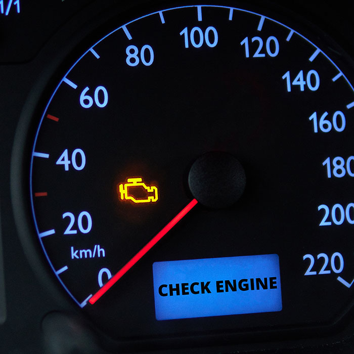 check engine light on a dashboard