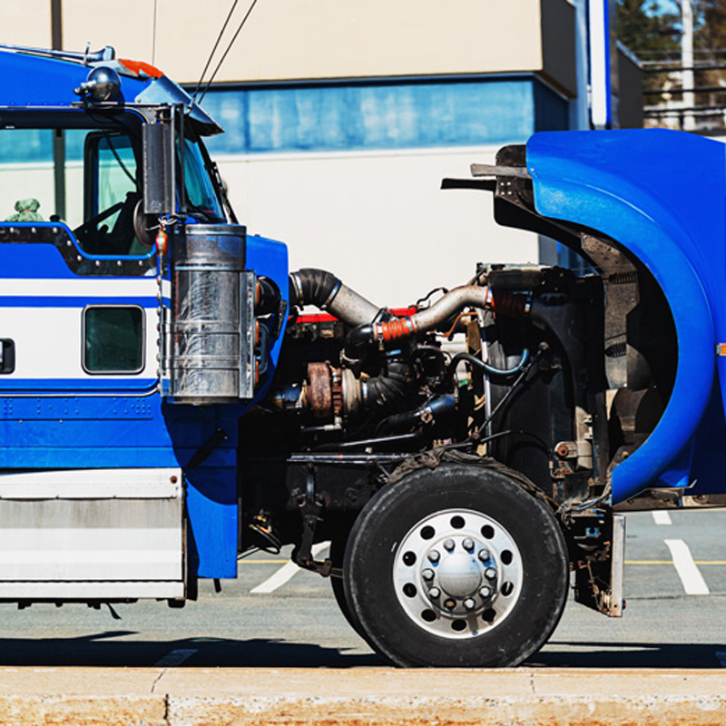semi with hood open ready for repairs