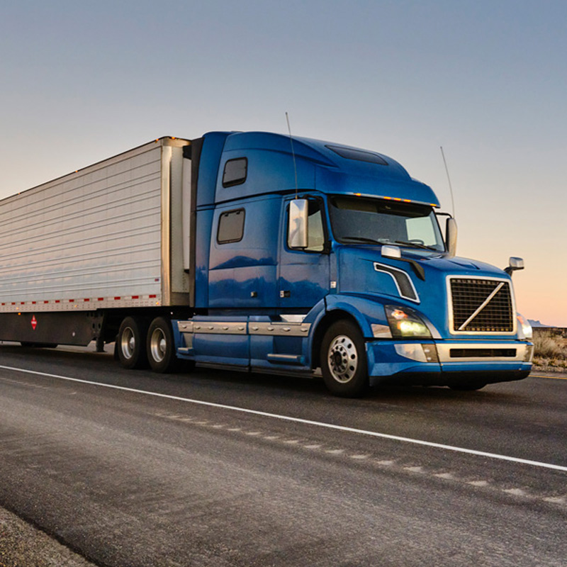 semi trailer driving on a road